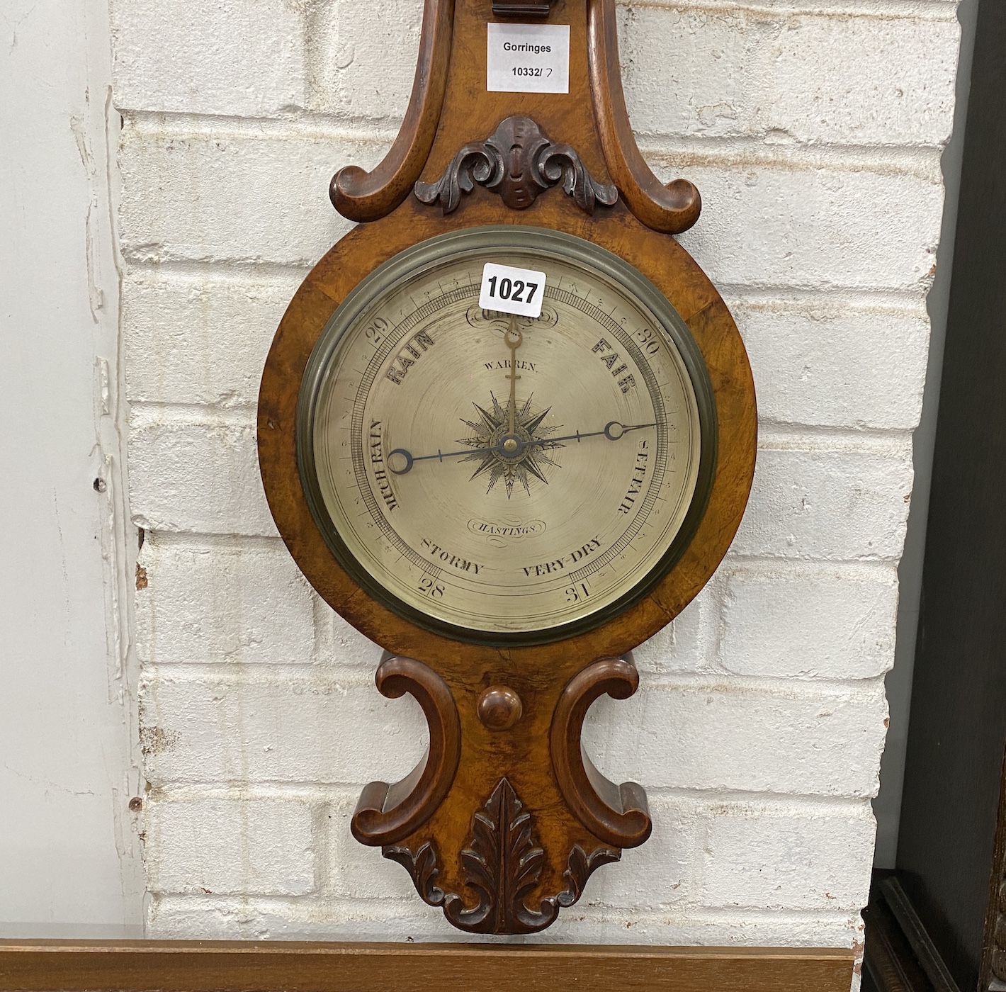 A Victorian pollard oak barometer and thermometer marked Warren of Hastings, height 92cm